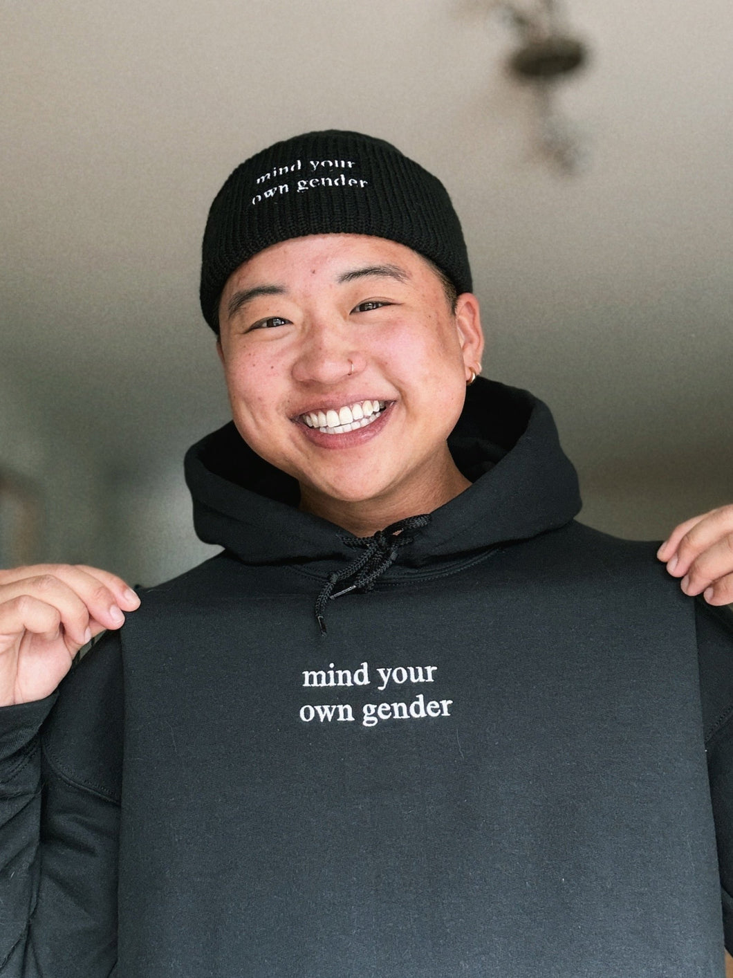 Embroidered Mind Your Own Gender Hoodie (20% of profits donated)